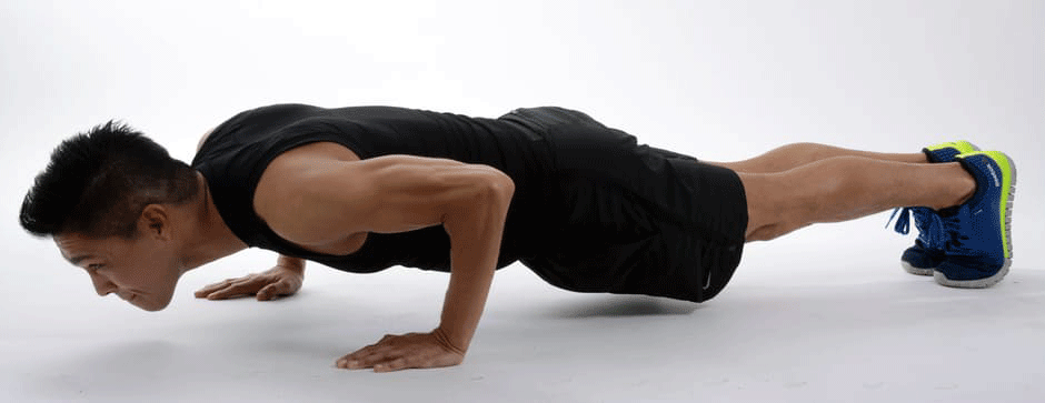 A man demonstrates good push-up form.